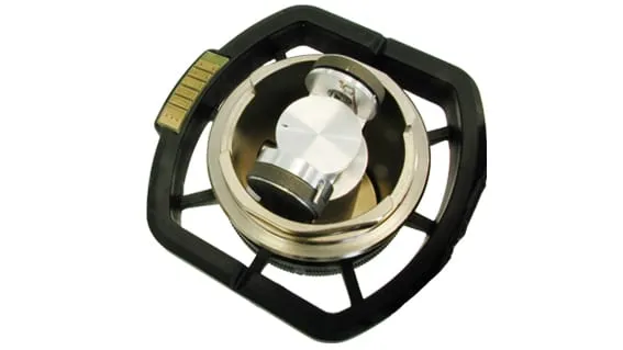 Top view of the Tilt-Rotation Stage seated in the black Phenom sample-holder frame, showing the central pivoting tilt mechanism.